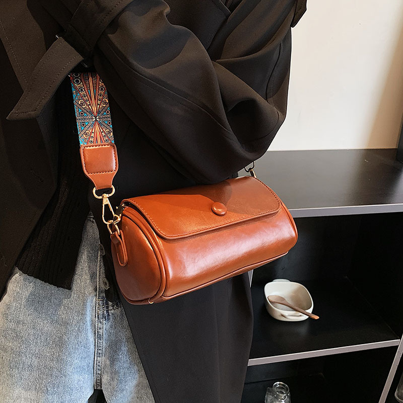 New bag with slanted body for women niche spring and summer fashion designer multifunctional cylindrical bag retro high-end solid color single shoulde