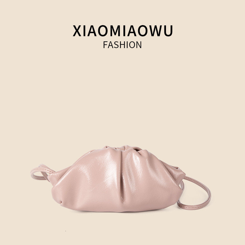 2025S designer new women oil wax leather hanging neck niche simple and melodious shoulder Korean commuting wrinkled mini dumpling bag
