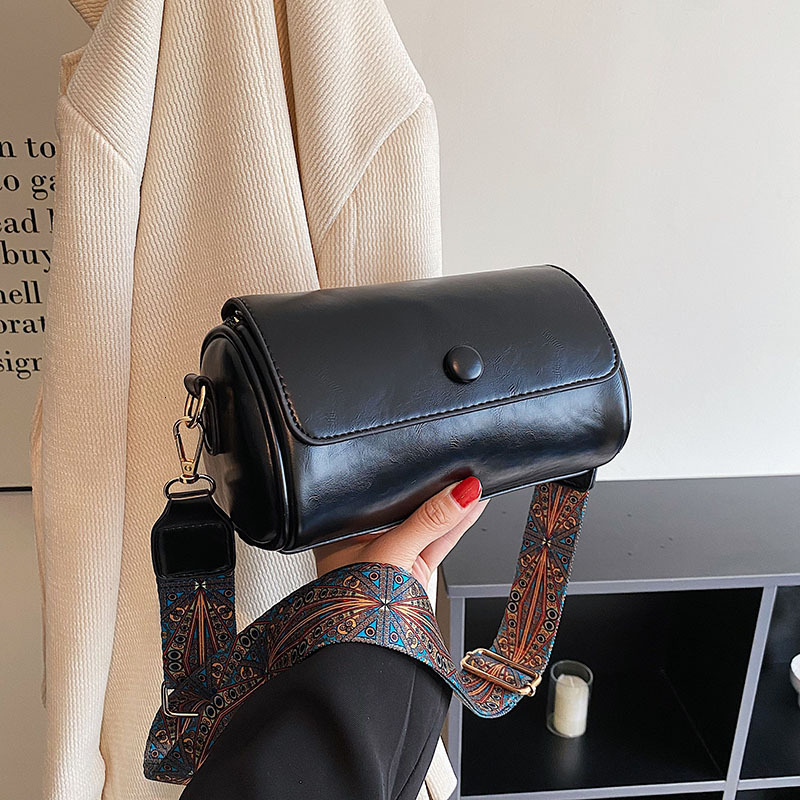New bag with slanted body for women niche spring and summer fashion designer multifunctional cylindrical bag retro high-end solid color single shoulde