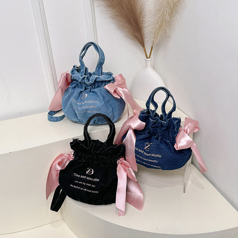 2025S designer bag new light luxury and high-end sense single shoulder crossbody large capacity drawstring denim cloth bag hand-held canvas handbag