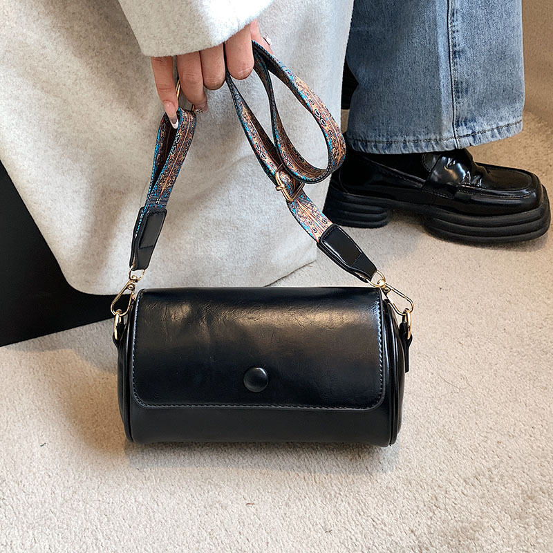New bag with slanted body for women niche spring and summer fashion designer multifunctional cylindrical bag retro high-end solid color single shoulde