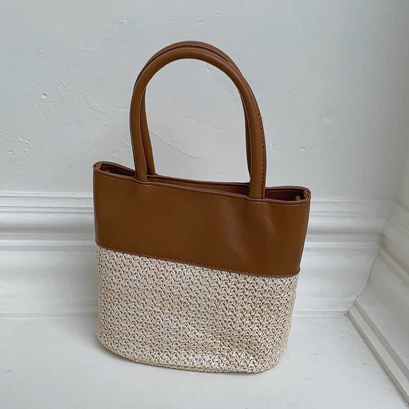 New Versatile Summer Large Capacity Straw Woven Bag and Korean Niche Holiday Womens Bag Single Shoulder Crossbody Fenghong