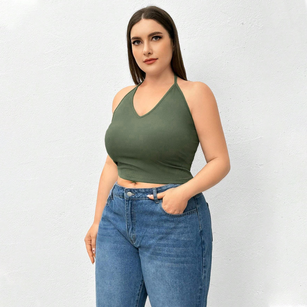 Oversized Womens Clothing with a Base Layer a Hanging Neck Camisole a Tank Top and a Spicy Knit Top Worn Outside