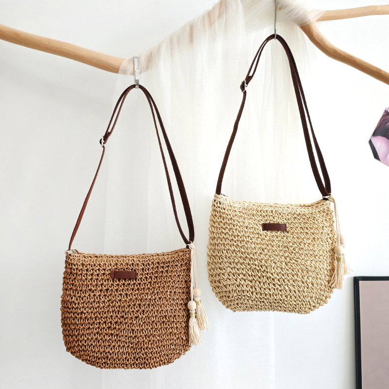 2025S designer summer new ins simple trend hand crossbody fashion vacation beach forest grass woven women bag