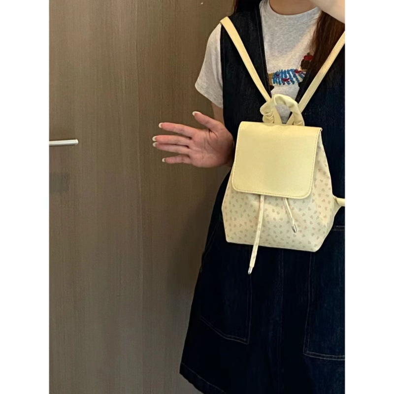 2025S designer cute pleated floral polka dot universal women bag trendy shopping and elegant small backpack casual outdoor commuting bag