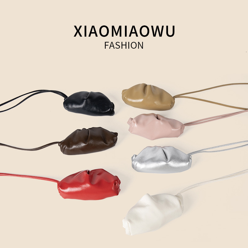 2025S designer new women oil wax leather hanging neck niche simple and melodious shoulder Korean commuting wrinkled mini dumpling bag