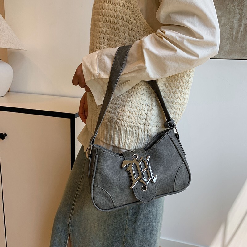 Advanced matte stick armpit for women 2025 new handheld French niche fashion single shoulder crossbody bag