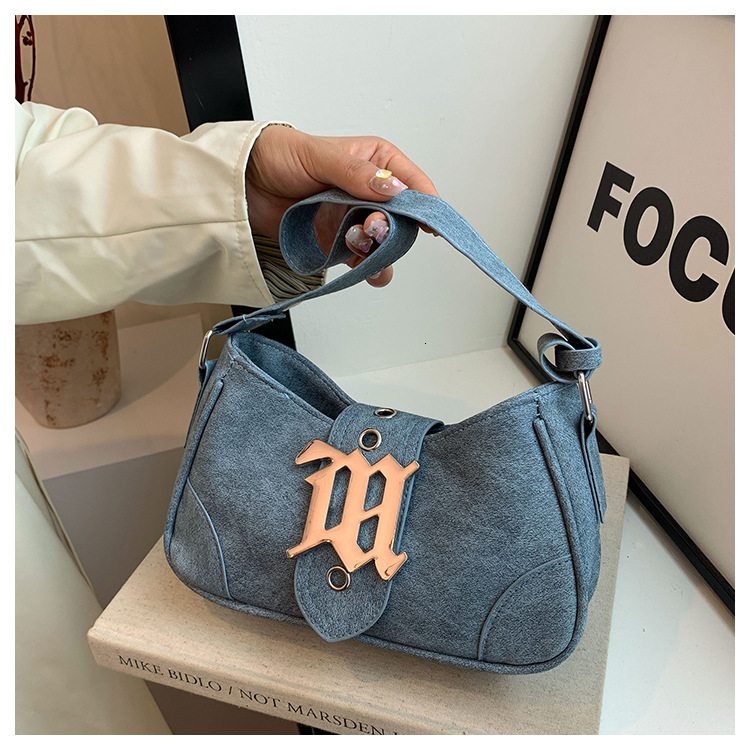 Advanced matte stick armpit for women 2025 new handheld French niche fashion single shoulder crossbody bag
