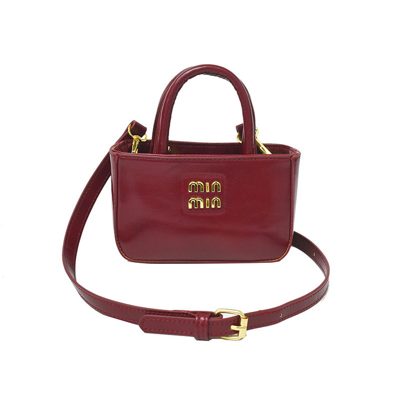 Free shipping designer bag Korean version 2025 popular mini hand-held small square bag, versatile and trendy parent-child crossbody lipstick bag