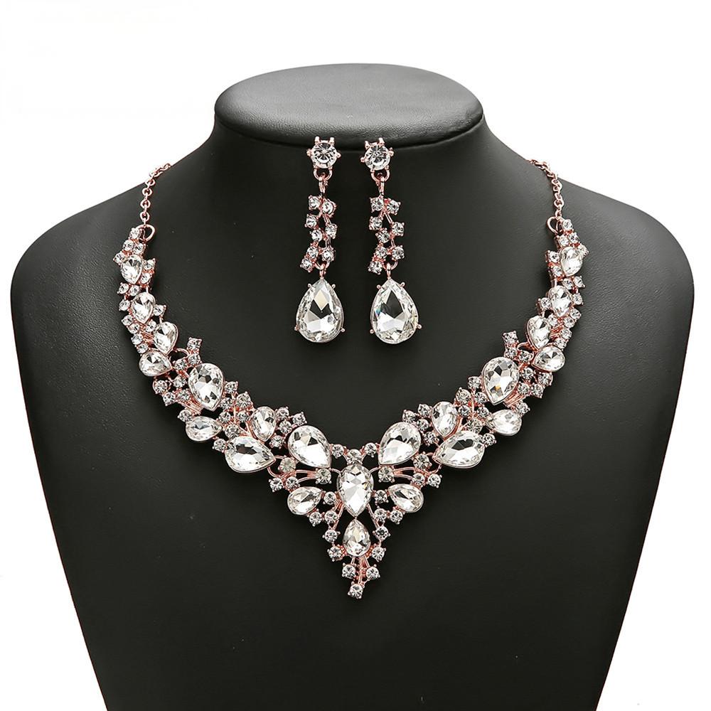 Sophisticated Rhinestone Bridal Accessory Ensemble: Classic Teardrop Necklace/Ear Piercing Pair