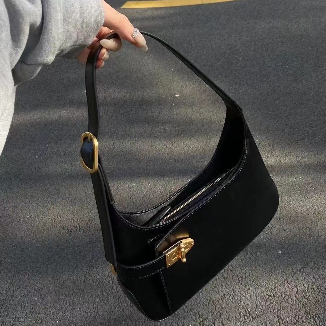 Small niche light luxury women's trendy armpit bags, high-end designs, fashionable, simple, exquisite, versatile handbags, and small bags