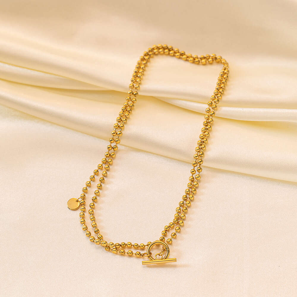 Medium to long sweater with stainless steel gold-plated overlay and OT buckle necklace, trendy women's collarbone chain