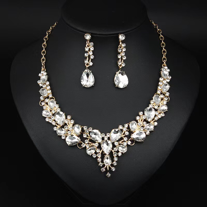 Sophisticated Rhinestone Bridal Accessory Ensemble: Classic Teardrop Necklace/Ear Piercing Pair