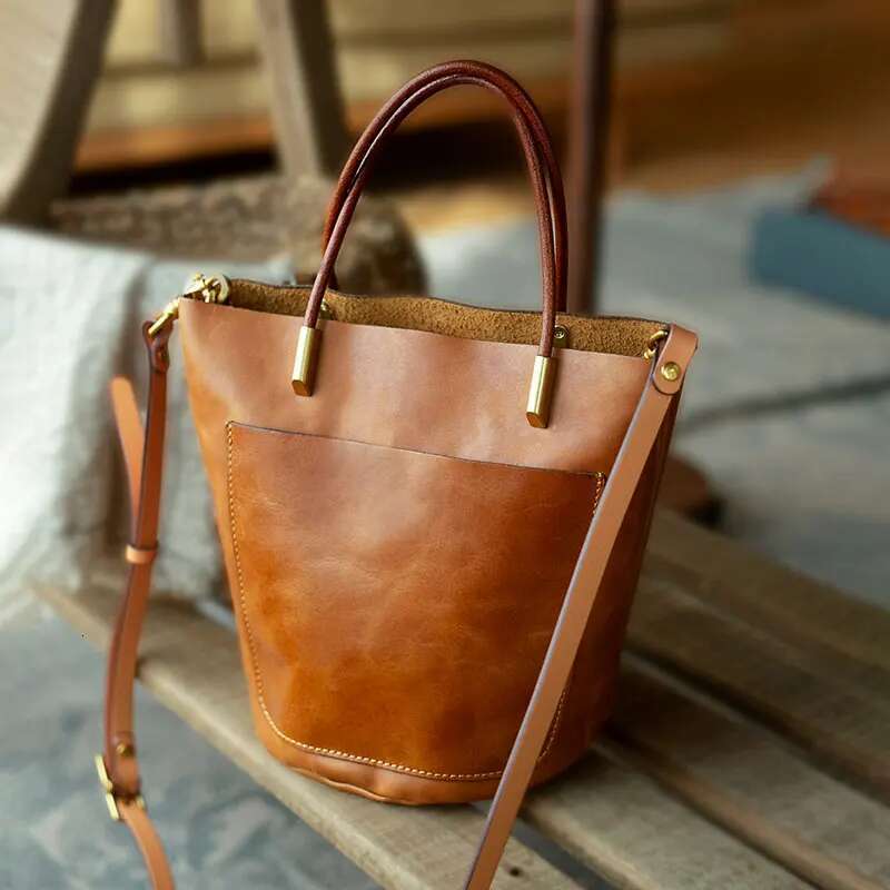 PNDME fashion designers handmade vegetable tanned cowhide women's small handbag simple genuine leather shoulder crossbody bag
