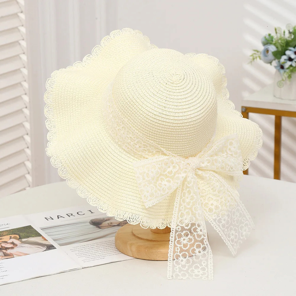 Womens Large Brim Straw Sun Hat French Style Spring Summer Beach Trendy Sun Protection with Butterfly Knot Detail 250516