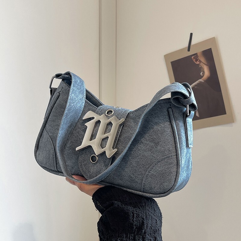 Advanced matte stick armpit for women 2025 new handheld French niche fashion single shoulder crossbody bag