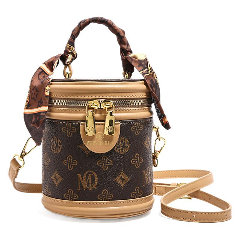 Cylinder bag 2025 new niche hand-held cylindrical bucket bag single-shouldered messenger old rice bucket bag
