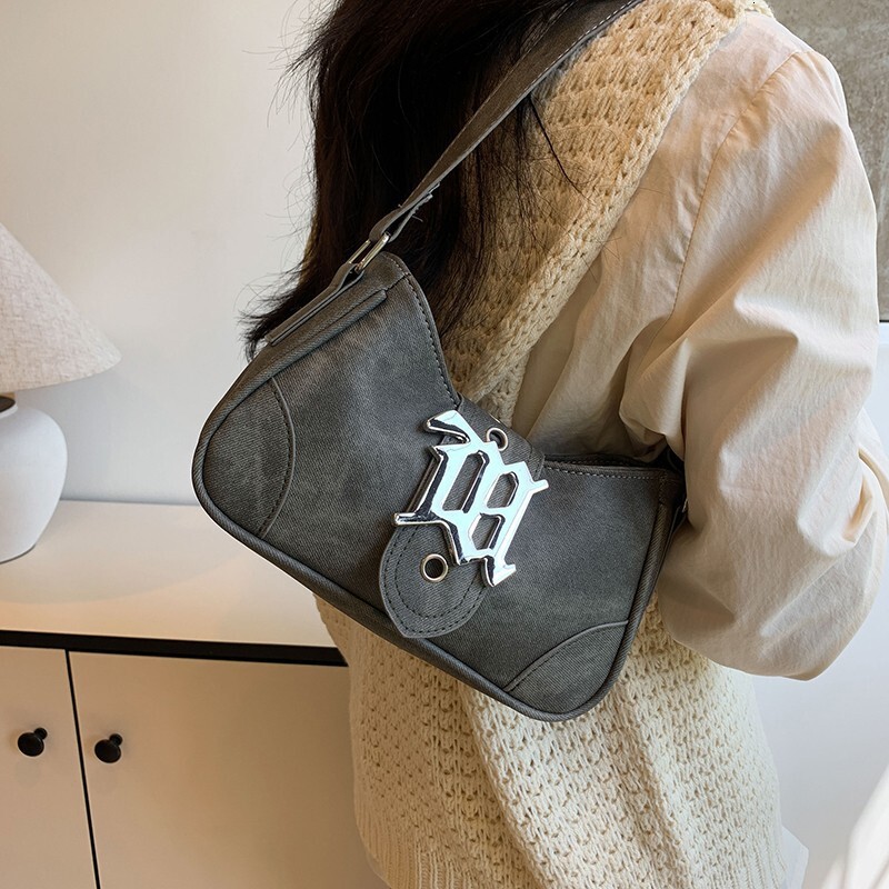 Advanced matte stick armpit for women 2025 new handheld French niche fashion single shoulder crossbody bag
