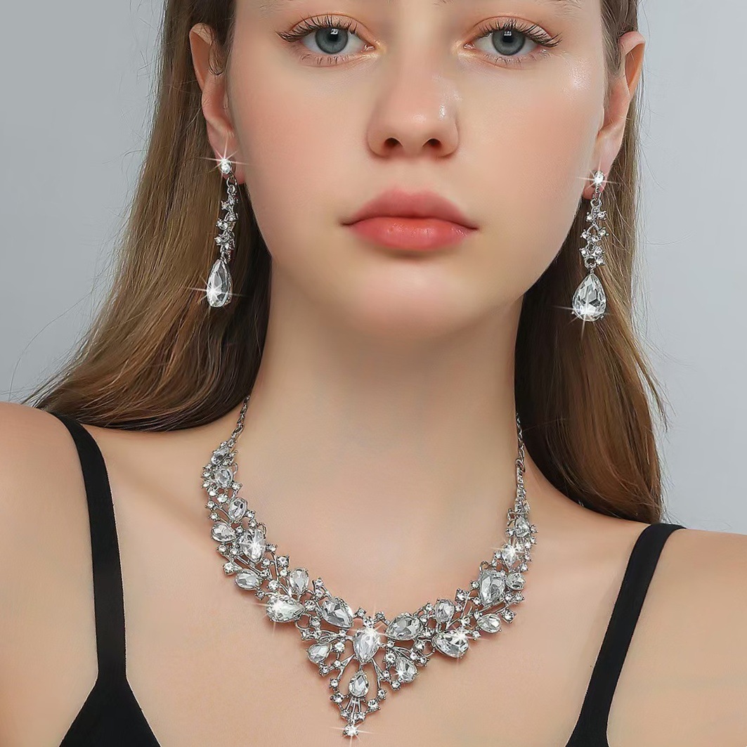 Sophisticated Rhinestone Bridal Accessory Ensemble: Classic Teardrop Necklace/Ear Piercing Pair