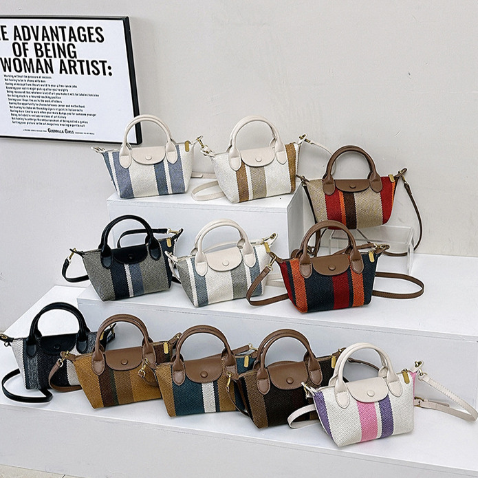 2025 Free Shipping Designer Women's Bag Shoulder Bag Summer New Tote Pattern Handbag High Quality Fashion Casual Crossbody Bag Makeup Bag