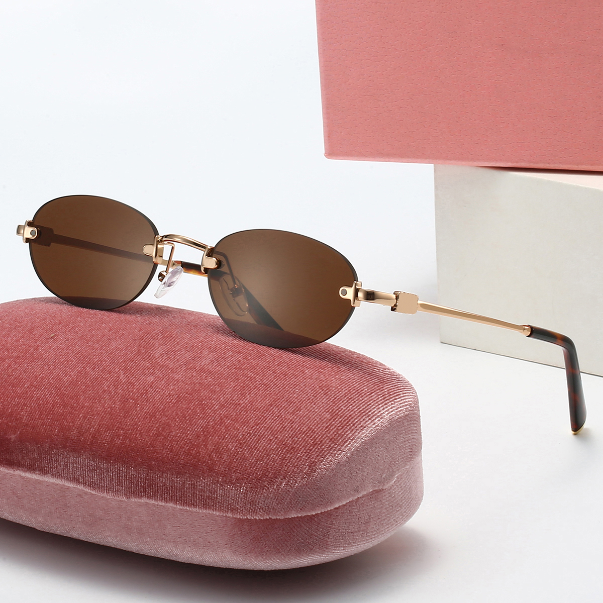 Designer sunglasses for women Rimless oval sunglasses High quality metal temples sunglasses Outdoor casual daily wear sunglasses