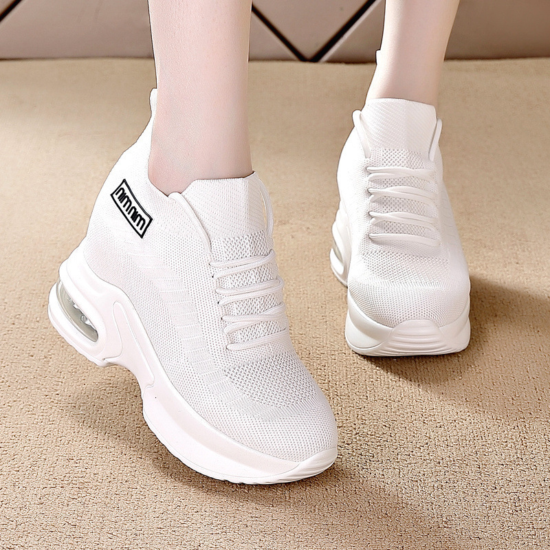 Black sporty women's round and wide toe shoes, designed with soft soles and comfortable surfaces, featuring an inner height increase