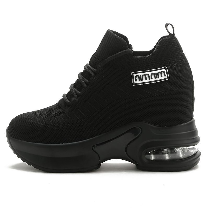 Black sporty women's round and wide toe shoes, designed with soft soles and comfortable surfaces, featuring an inner height increase