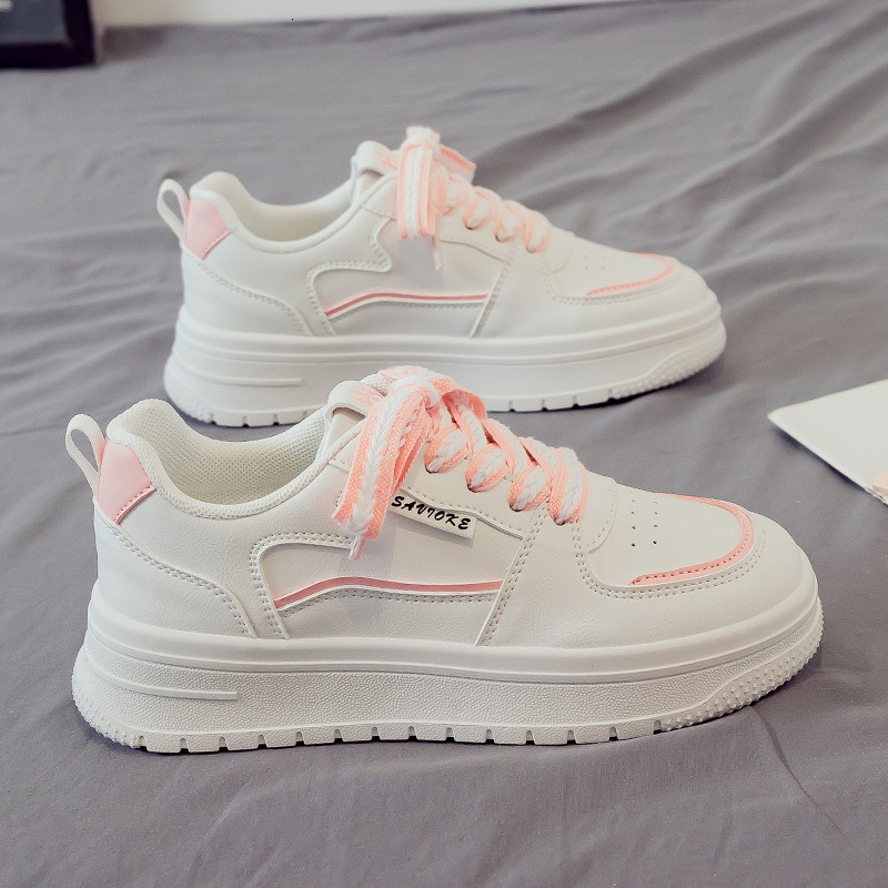 New white women's breathable multifunctional sports shoes designed by fashionable and casual soft soled sports shoes designer