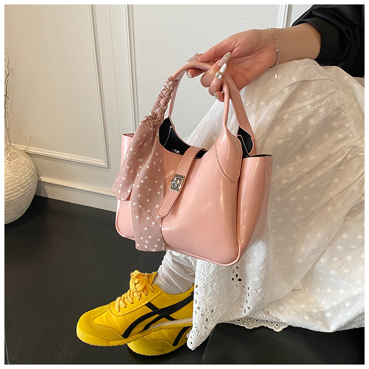 2025 Free Shipping Designer Women's Bag Fashion Handbag New Korean Version Casual Belt Metal Buckle Simple Shoulder Bag Red Phone Bag Student Bag