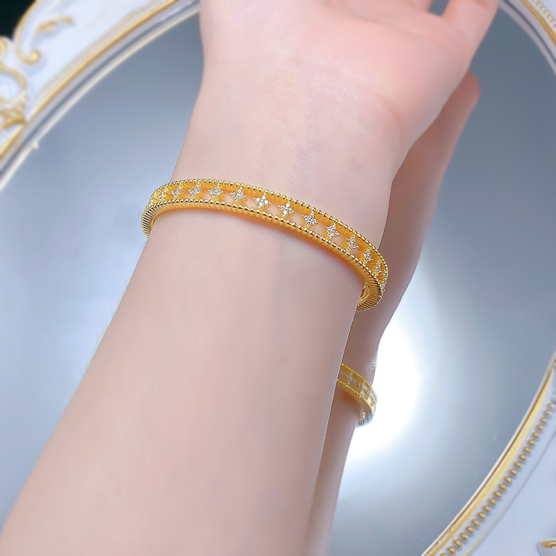 Elegant S925 Silver Four-Leaf Clover Open Cuff Bracelet, Gold-Plated, Chic and High-End Fashion for Women.