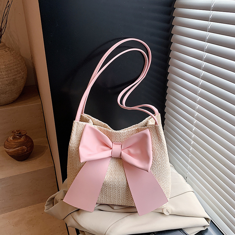 2025 New Summer Grass Weaving Designer Women's Underarm New Soft and Elegant Bow shaped Bucket Multi functional Shoulder Bag