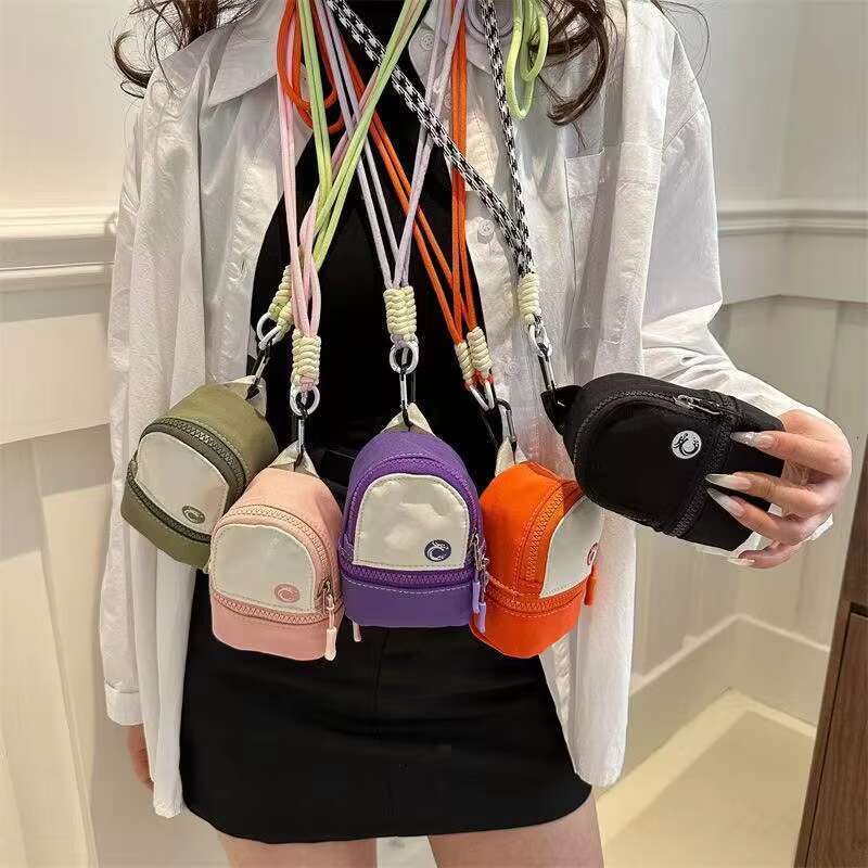 Mini Crossbody Coin Purse Cute Neck Pouch Small Bag for Women and Men Lightweight Pocket Bag with Zipper and Adjustable Cord for Travel and Daily Use