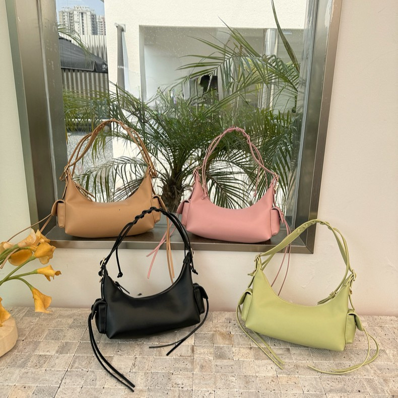 New Fashion Bow Korean Edition Spicy Girl Style Dumpling Bun Designer Fashion Single Shoulder Motorcycle Skew trend leisure Women s Bun