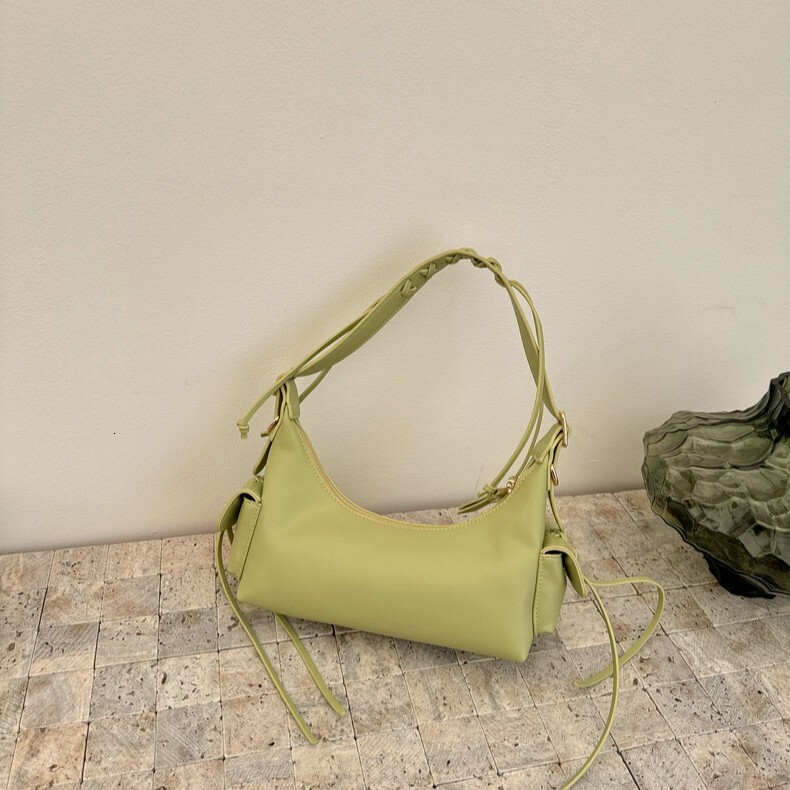 New Fashion Bow Korean Edition Spicy Girl Style Dumpling Bun Designer Fashion Single Shoulder Motorcycle Skew trend leisure Women s Bun