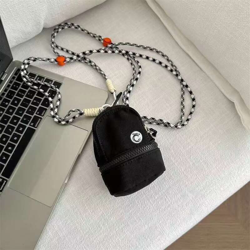 Mini Crossbody Coin Purse Cute Neck Pouch Small Bag for Women and Men Lightweight Pocket Bag with Zipper and Adjustable Cord for Travel and Daily Use