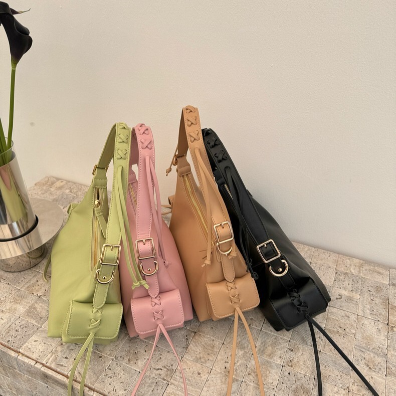 New Fashion Bow Korean Edition Spicy Girl Style Dumpling Bun Designer Fashion Single Shoulder Motorcycle Skew trend leisure Women s Bun