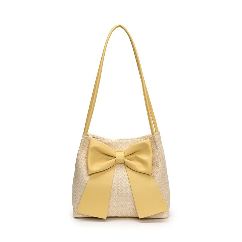 2025 New Summer Grass Weaving Designer Women's Underarm New Soft and Elegant Bow shaped Bucket Multi functional Shoulder Bag