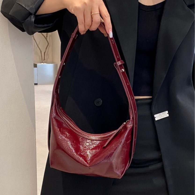 new leisure leather commuting slanted body women s trend new cowhide shoulder niche multifunctional design armpit bag