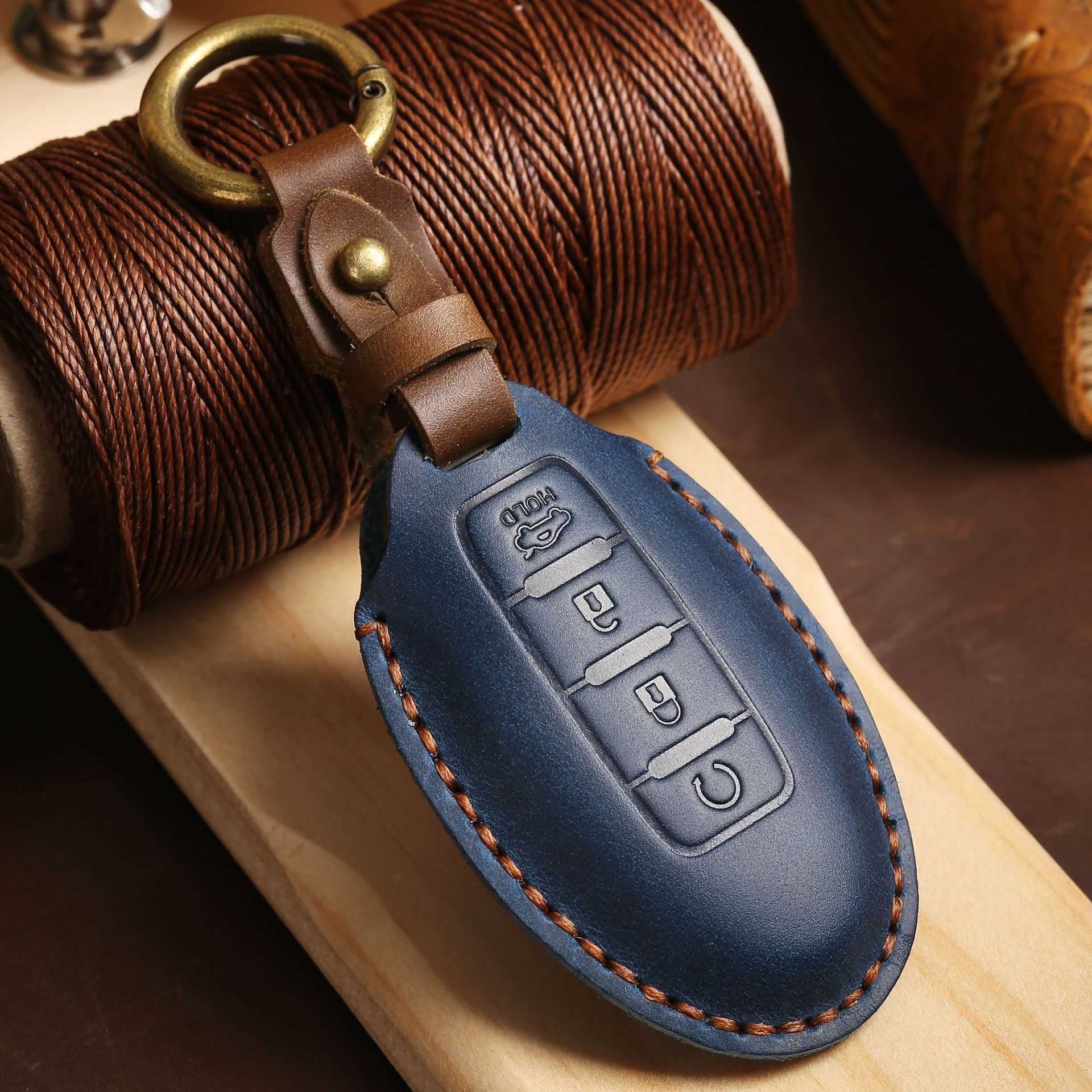 Car Key Handmade Leather Suitable for Nissan key case Teana Xuan Yi Bluebird Qi Jun Qi Da Lou Lan genuine leather car key bag X25519