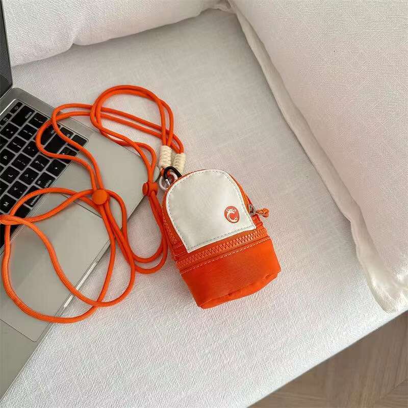 Mini Crossbody Coin Purse Cute Neck Pouch Small Bag for Women and Men Lightweight Pocket Bag with Zipper and Adjustable Cord for Travel and Daily Use