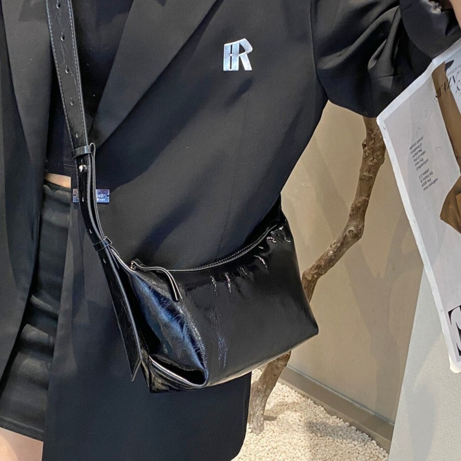 new leisure leather commuting slanted body women s trend new cowhide shoulder niche multifunctional design armpit bag