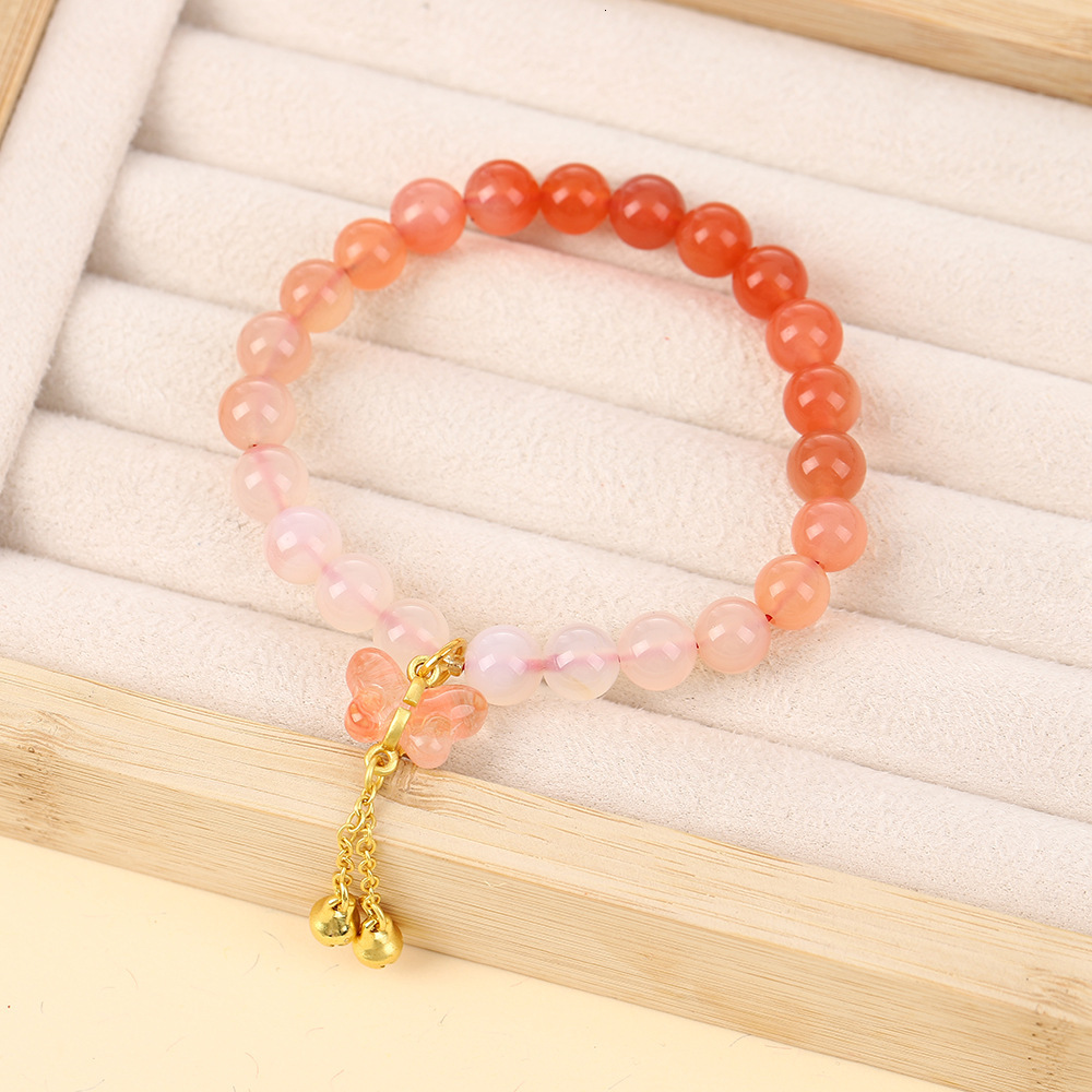 butterfly pendant with a high-end feel for girls, featuring Chinese style salt source agate design and gradient crystal powder bracelet