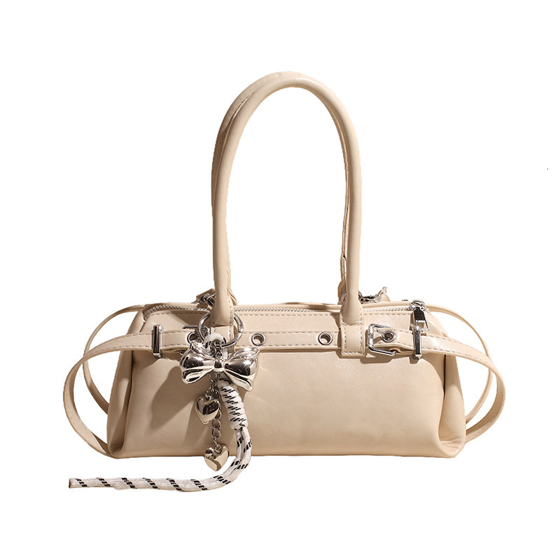 Handheld fashionable casual baguette for women in spring 2025 new high-end and versatile commuting shoulder crossbody bag