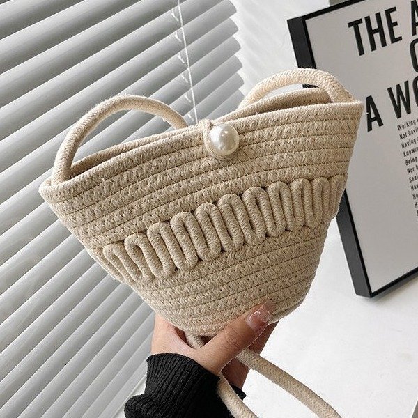 Summer new women's woven fashionable hand-held cross shoulder bucket shaped beach bag, bucket beach pleated cloud bag, casual fashion versatile p
