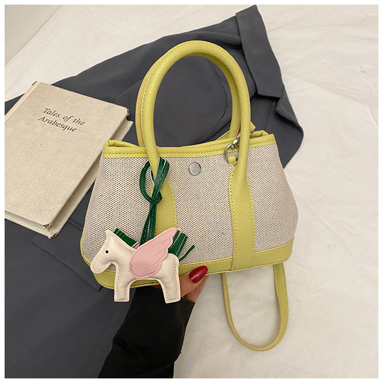 Advanced and fashionable hand-held bucket for women in spring 2025 versatile tote bag popular crossbody bag