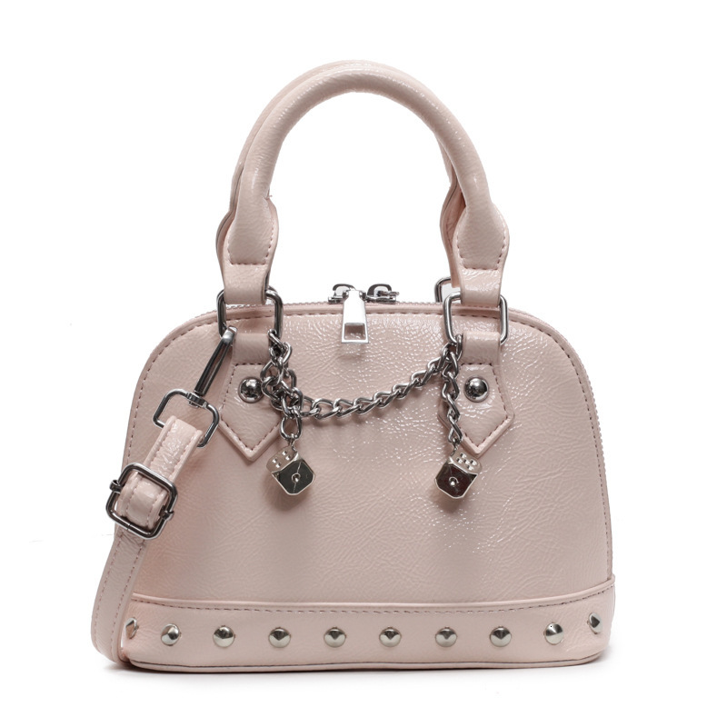 2025 new niche design high-end rivet hand-held shell versatile chain shoulder diagonal cross women's bag