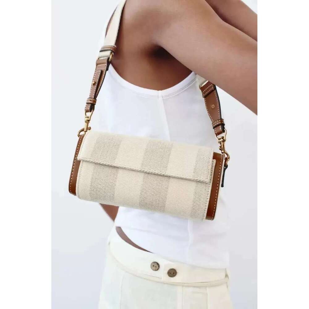 Autumn New Women's Vanilla Yellow Flip Cover Versatile Commuting Bag, Cylindrical Shoulder Crossbody Bag