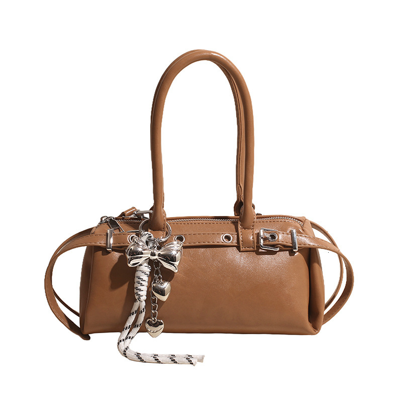 Handheld fashionable casual baguette for women in spring 2025 new high-end and versatile commuting shoulder crossbody bag