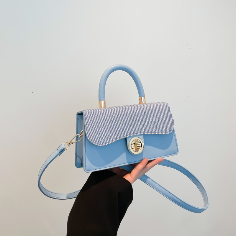 Korean style simple and fashionable 2025 lock buckle contrasting color commuting women's western-style crossbody with bill of lading shoulder sma