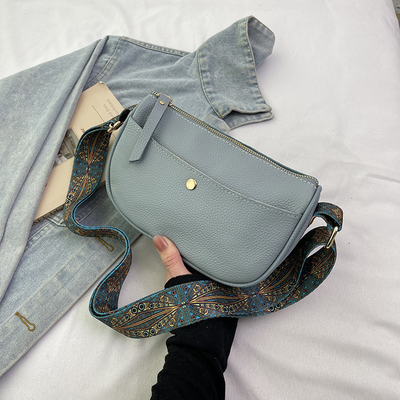 Genuine leather women's 2025 new style temperament top layer cowhide casual saddle fashionable wide shoulder strap crossbody bag